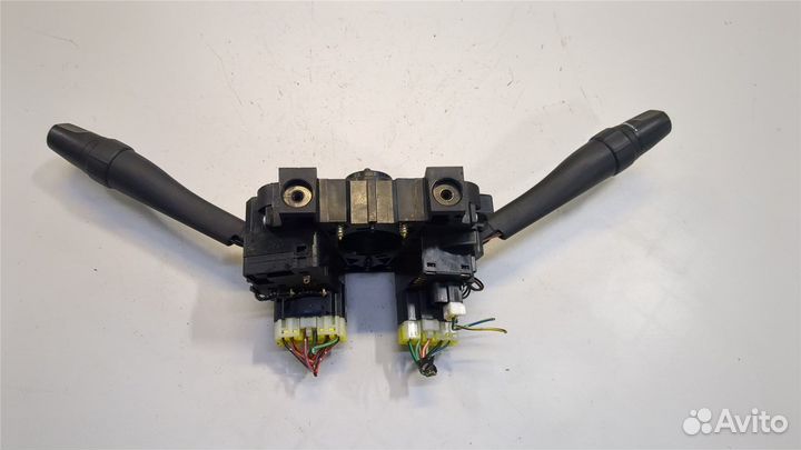 Переключатель поворотов и дворников Nissan Primera