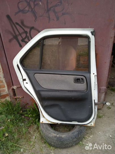 Дверь задняя левая Ниссан Блюберд EU14