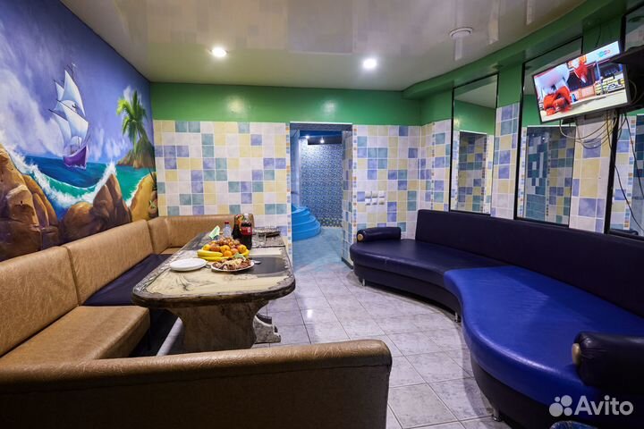 Сауна с теплым бассейном и камином