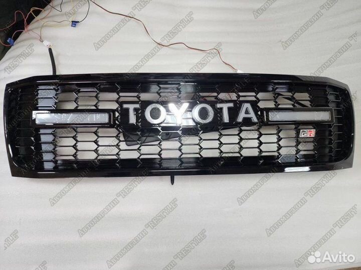 Решетка радиатора передняя Toyota Land Cruiser 100