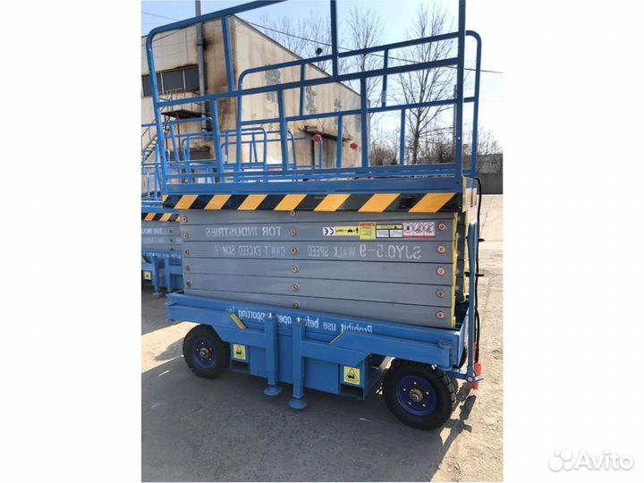 Ножничный подъемник