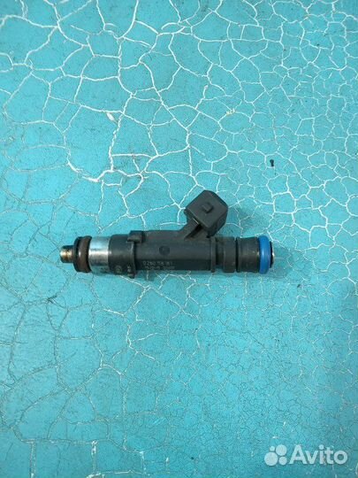 Форсунка топливная Opel Astra J P10 A14XER 2011