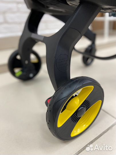 Коляска-автокресло Doona flame red