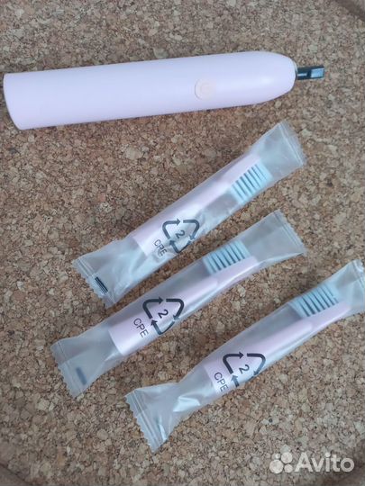 Электрическая зубная щетка