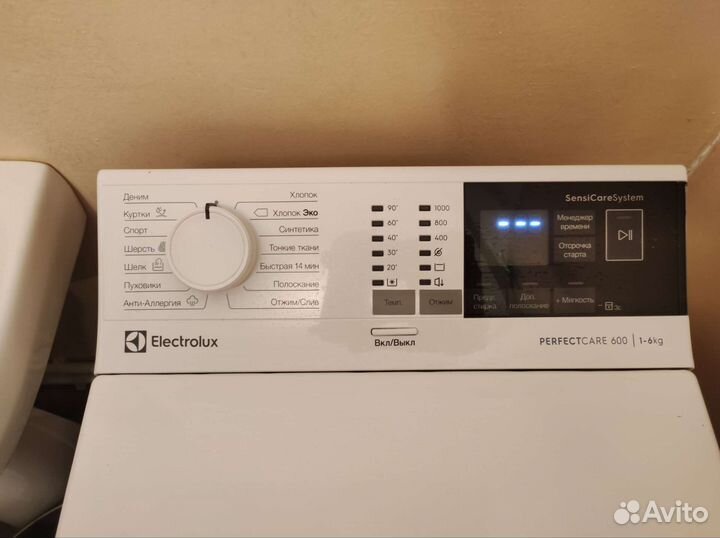 Стиральная машина с вертикальной загрузкой