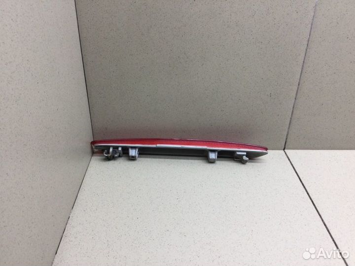 Отражатель в бампер задний правый Mazda Cx 9