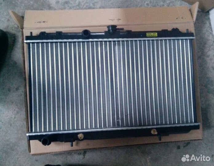 Радиатор охлаждения Nissan Almera N16
