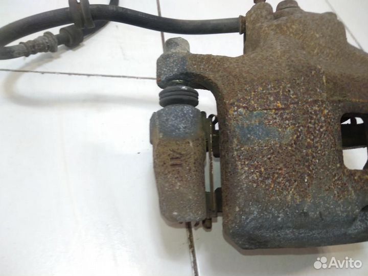 Суппорт передний правый Mitsubishi Outlander GF 20