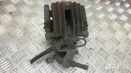 Суппорт тормозной задний левый skoda octavia A5 (1