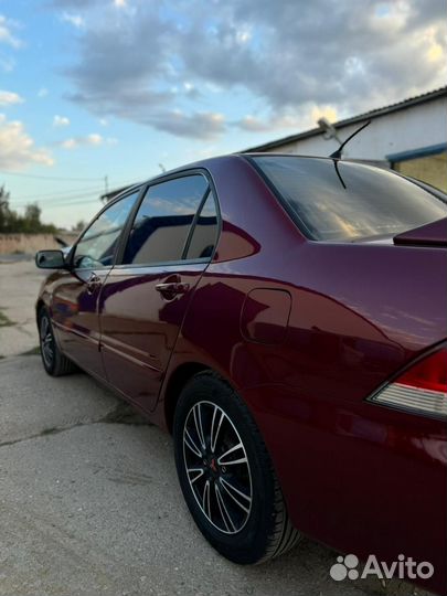 Mitsubishi Lancer 1.6 МТ, 2006, 240 000 км