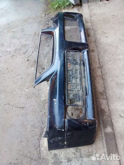 Бампер с решеткой Nissan Cube Z10