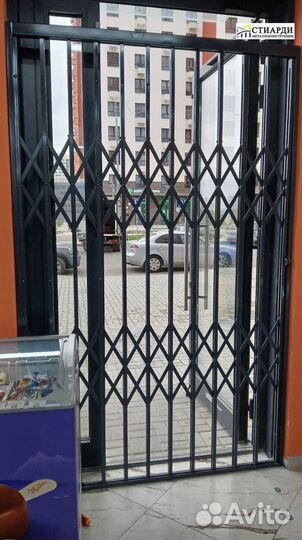 Решетка гармошка на двери