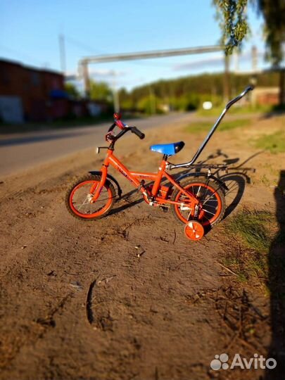 Велосипед с родительской ручкой