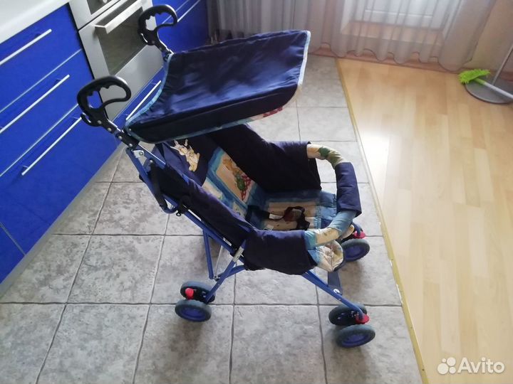 Прогулочная коляска трость