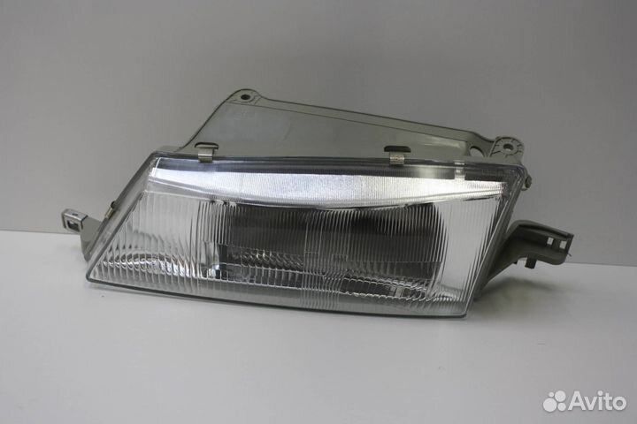 Фара левая Daewoo Nexia рест. (2002 - 2008)