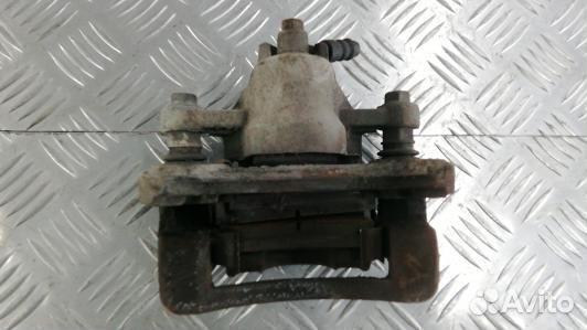 Суппорт тормозной задний правый KIA CEE'D 1 (NBR05