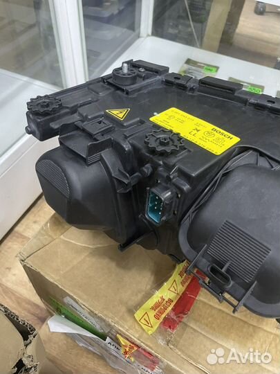 Фара ксеноновая левая Bmw E38