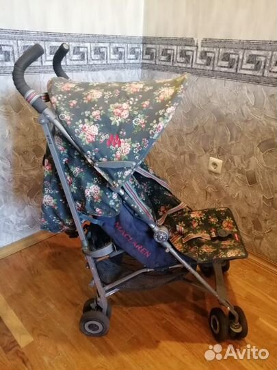 Детская прогулочная коляска трость