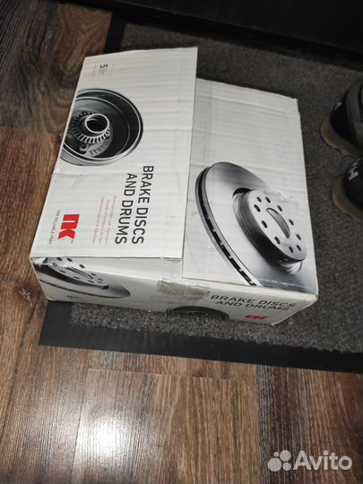 Диск тормозной передний 203418 NK новый