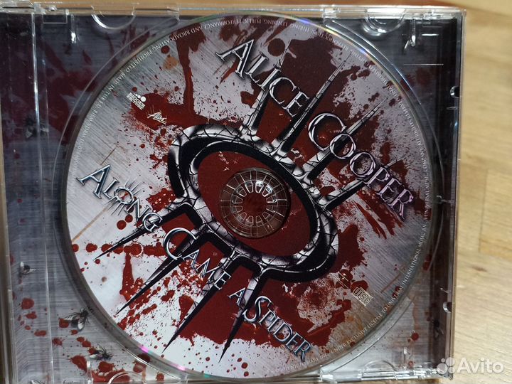 Alice cooper. Along game a spider