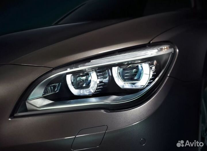 Стекло фары BMW 7 F01, F02 2008-2015