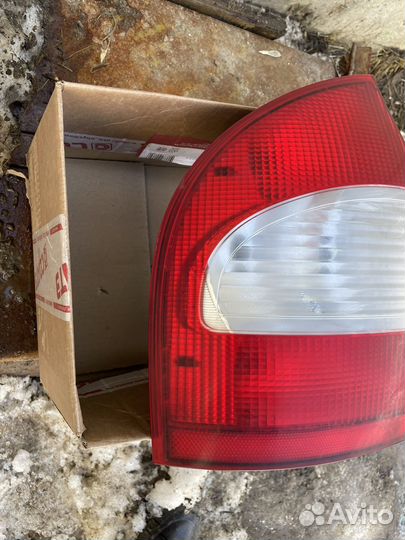 Задний левый фонарь Калина седан