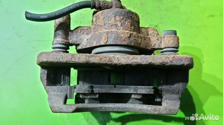 Суппорт передний левый для Mazda 626 GF