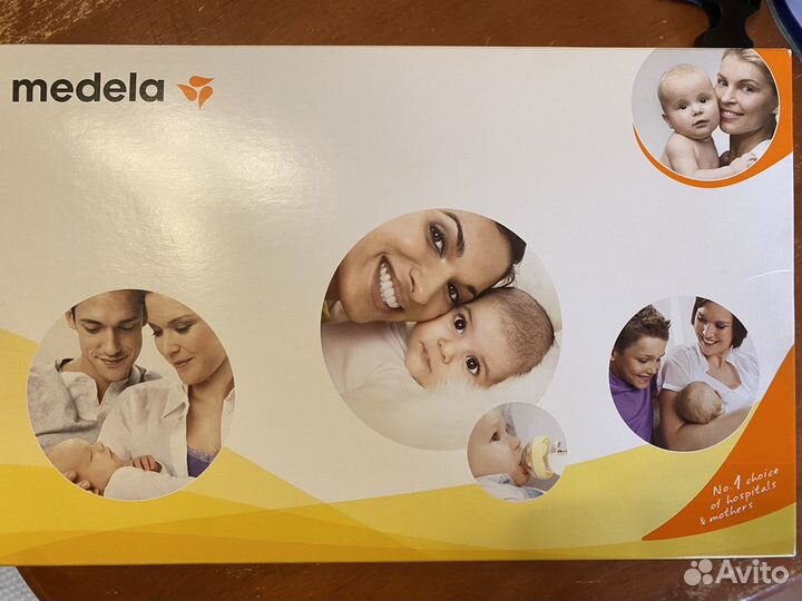 Молокоотсос medela ручной и накладки силиконовые