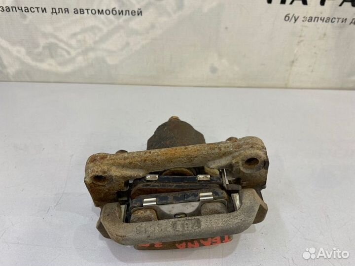 Суппорт задний правый Nissan Teana J31