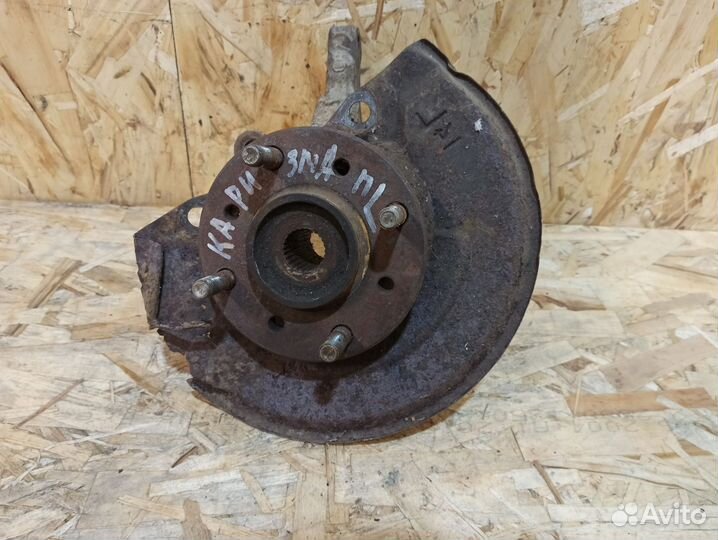 Кулак поворотный левый Mitsubishi Carisma