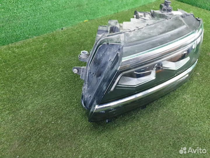 Фара левая Volkswagen Tiguan