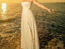 Роскошное свадебное платье цвета айвори