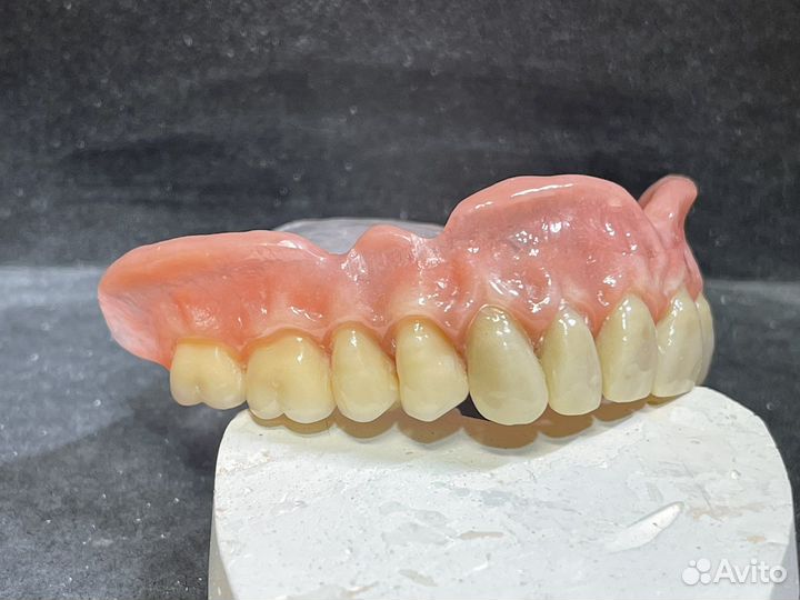 Зубной техник