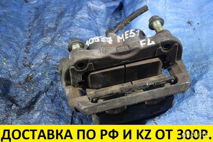 Суппорт тормозной передний Nissan Elgrand 41011WL0