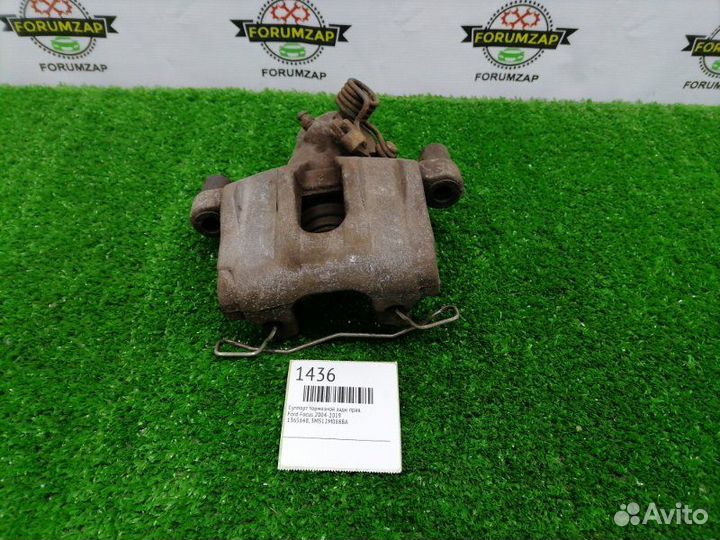 Суппорт тормозной задний правый Ford Focus