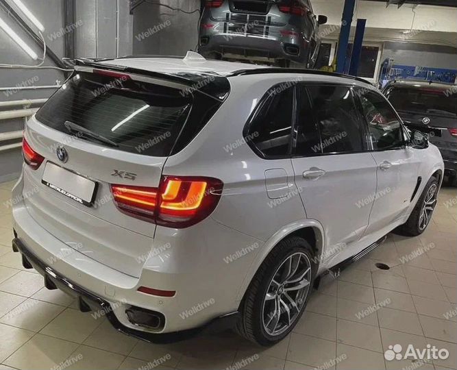 Лезвия BMW X5 F15 в стиле G05 черный глянец