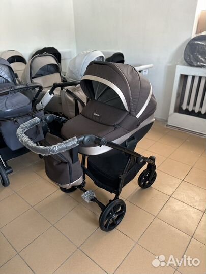 Tutis Nanni коричневая и черная Коляска с рождения