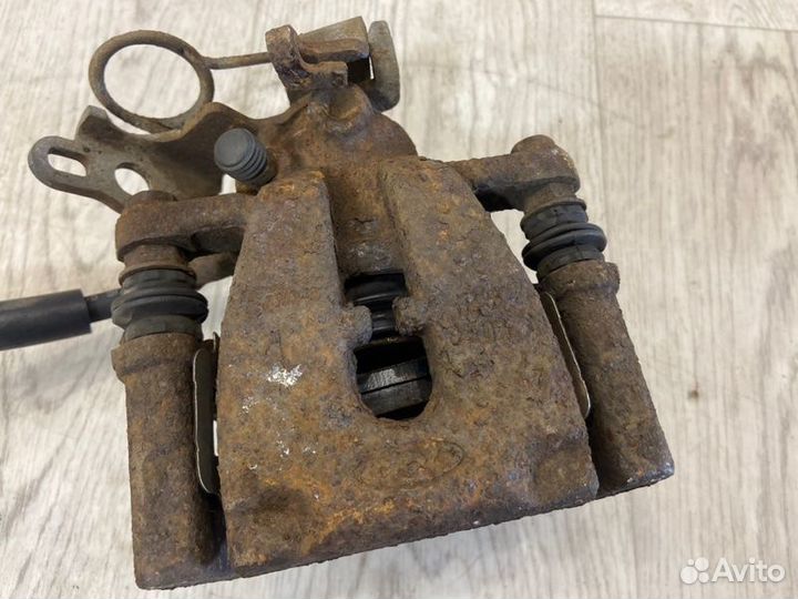 Суппорт тормозной задний левый Ford Kuga DR txda