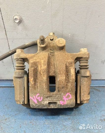 Суппорт задний левый Mazda Cx-7 ER