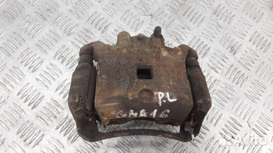 Суппорт тормозной передний левый nissan juke F15