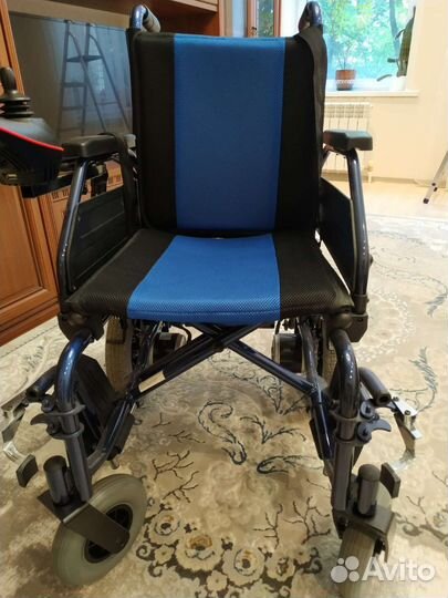 Инвалидная коляска с электроприводом