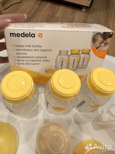 Молокоотсос medela и бутылочки для хранения