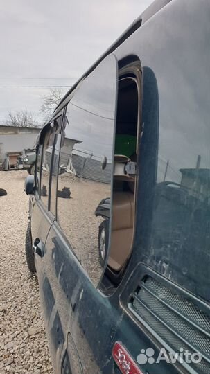 Стекло собачника левое на toyota land cruiser UZJ1