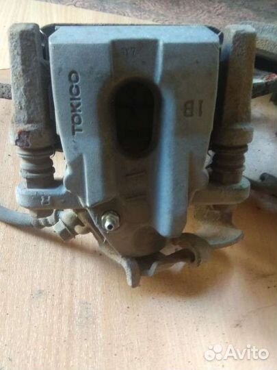 Суппорт задний Тойота Королла 150 Аурис