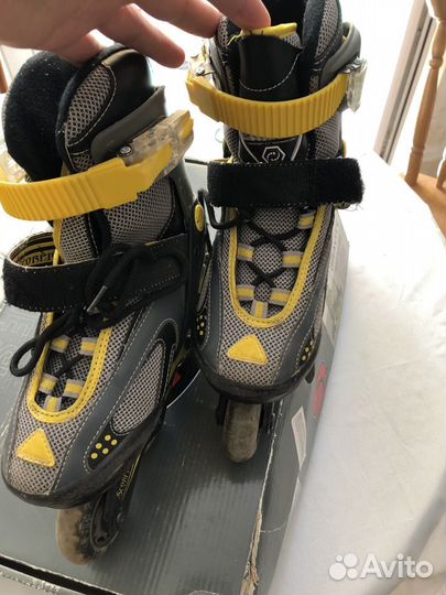 Роликовые коньки