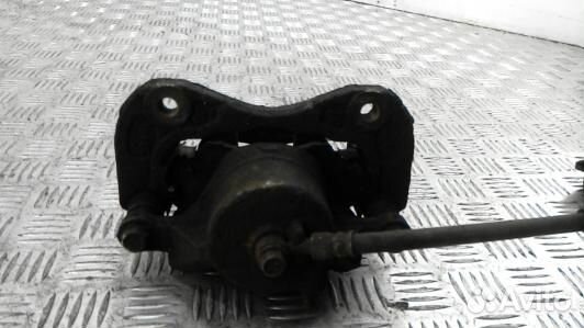 Суппорт тормозной передний левый hyundai tucson JM