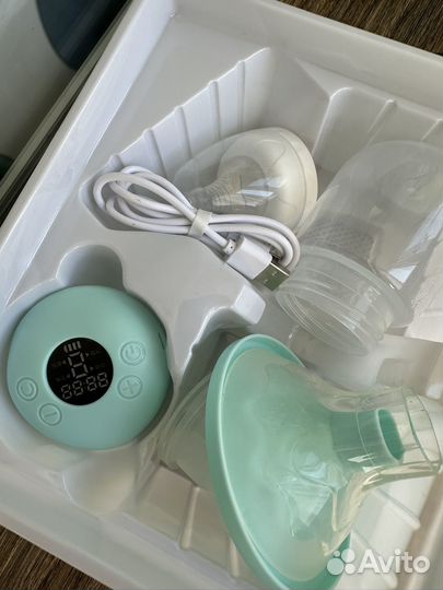 Молокоотсос электрический новый