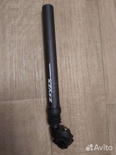 Подседедельный штырь с амортизацией