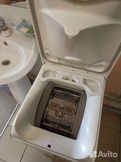 Стиральная машинка с вертикальной загрузкой