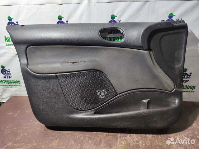 Обшивка двери передней левой Peugeot 206